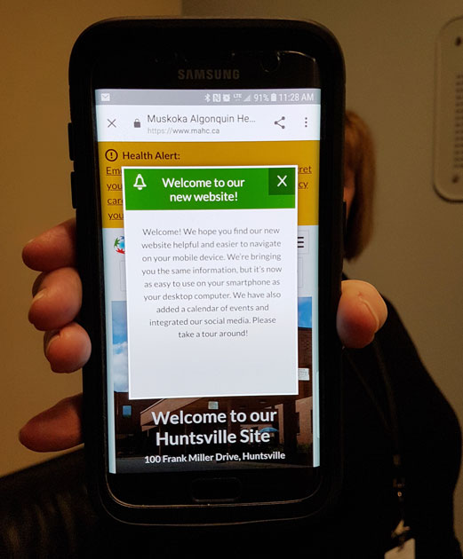 Smartphone displaying MAHC new website